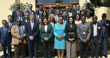 Family photo of delegates at CACH in London